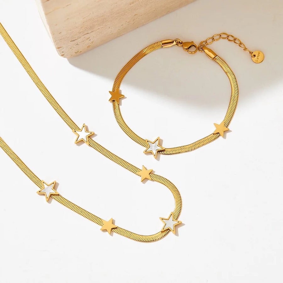 Gold herringbone chain with tiny star charms